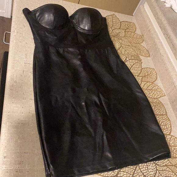 It’s a black cute tube dress - Picture 2 of 3